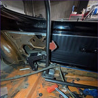 A PMR chromoly main hoop being installed n a Plymouth Duster