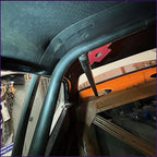 A PMR NHRA chromoly main hoop being installed n a Plymouth Duster