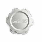 An aluminum fuel cell cap with a white PMR logo in the center and pre-drilled bolt holes around the outer rim, shown on a white background.